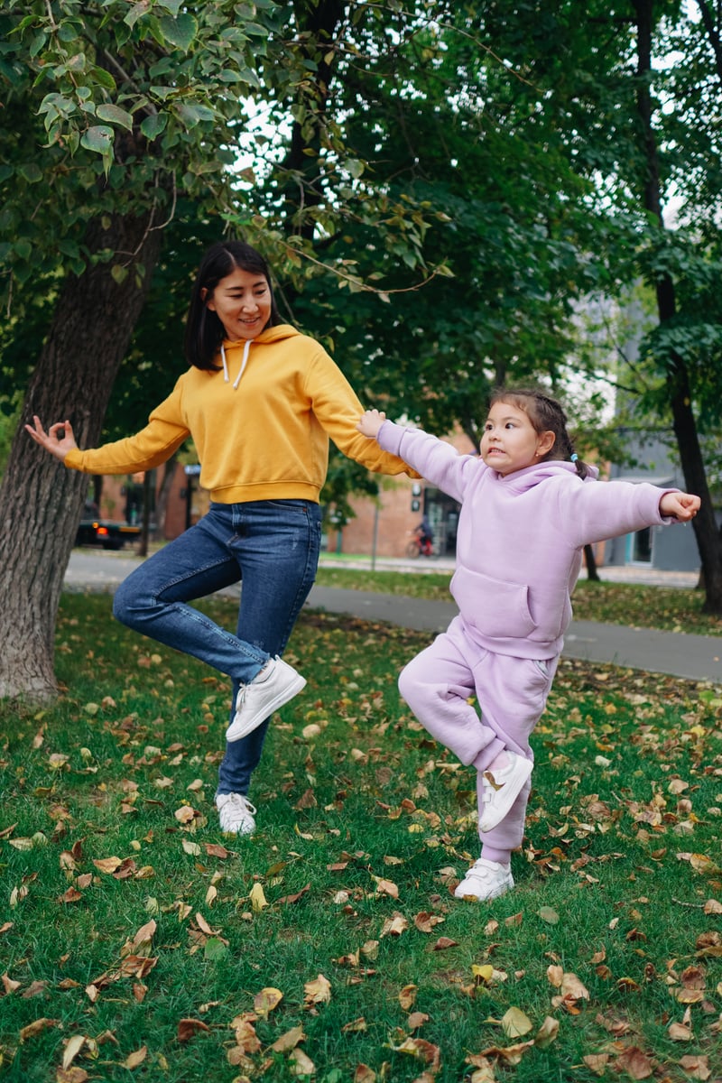 Mother Playing with Child Outdoors